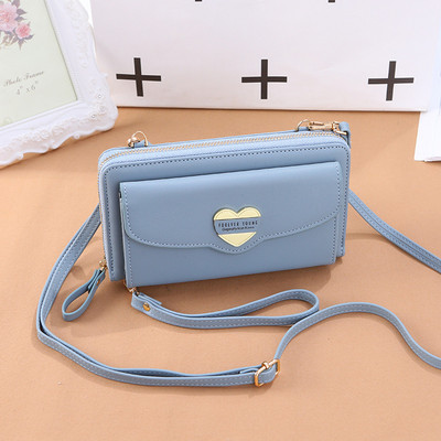 Νέο μοντέλο γυναικείο πορτοφόλι με δύο θήκες και μεταλλική διακόσμηση