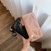 Sieviešu maka reljefa āda ar rokturi