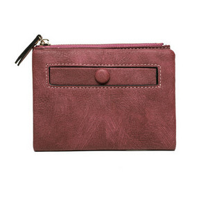 Γυναικείο μικρό πορτοφόλι με τσέπη για κέρμα και μεταλλικό κούμπωμα