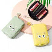 Γυναικείο έκο δερμάτινο πορτοφόλι με αλυσίδα και απλικέ