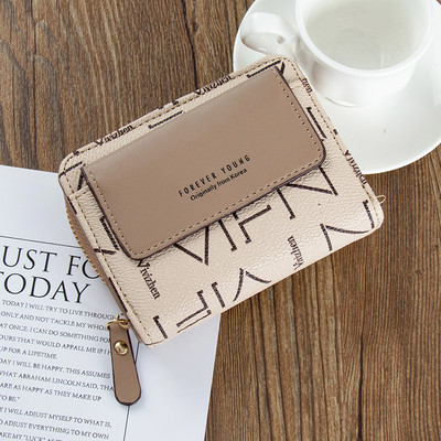 Γυναικείο μίνι πορτοφόλι με δύο διαμερίσματα και επιγραφή