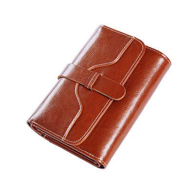 Γυναικείο πορτοφόλι από οικολογικό δερμάτινο απλό μοντέλο με μεταλλική στερέωση