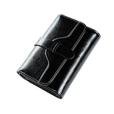 Γυναικείο πορτοφόλι από οικολογικό δερμάτινο απλό μοντέλο με μεταλλική στερέωση