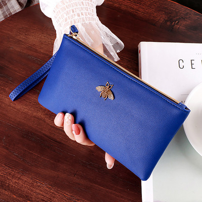 Γυναικείο πορτοφόλι απλό μοντέλο από οικολογικό δέρμα με μεταλλική διακόσμηση