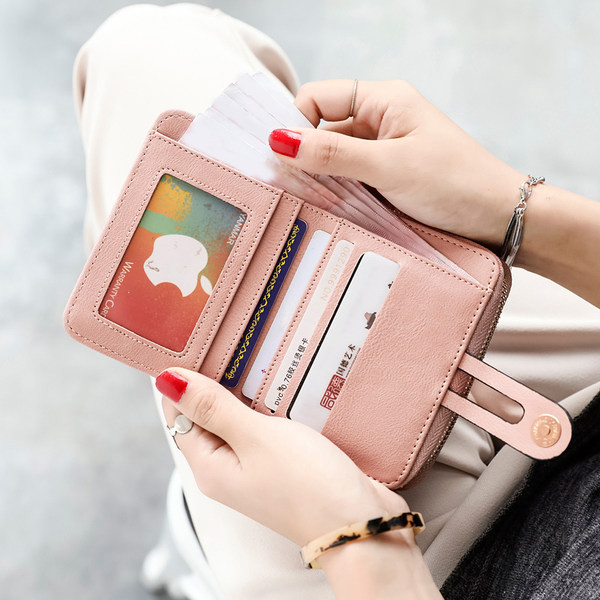 Mazs sieviešu maciņš ar vairākiem nodalījumiem - eko āda