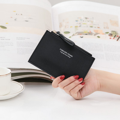 Λεπτό μικρό πορτοφόλι για κέρματα και κάρτες