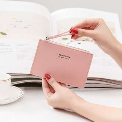 Λεπτό μικρό πορτοφόλι για κέρματα και κάρτες