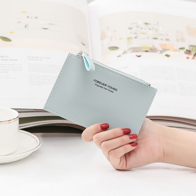 Λεπτό μικρό πορτοφόλι για κέρματα και κάρτες