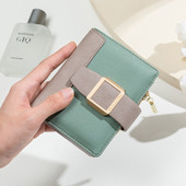 Νέο μοντέλο γυναικείο δερμάτινο πορτοφόλι με μεταλλική διακόσμηση σε διάφορα χρώματα