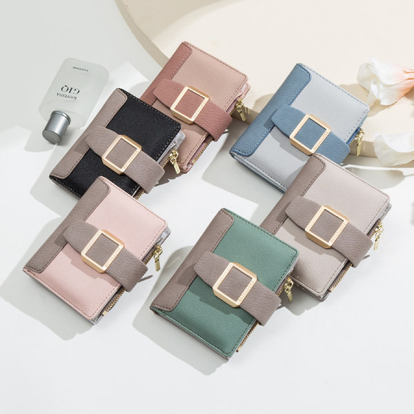 Νέο μοντέλο γυναικείο δερμάτινο πορτοφόλι με μεταλλική διακόσμηση σε διάφορα χρώματα