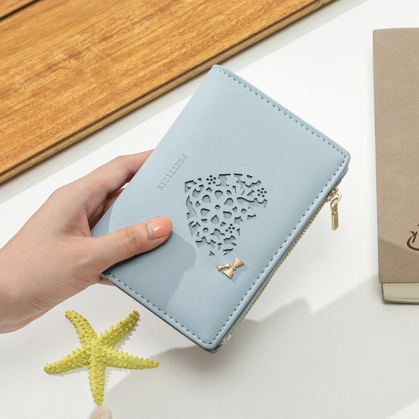 Sieviešu maks ar reljefu ādas un metāla apdari