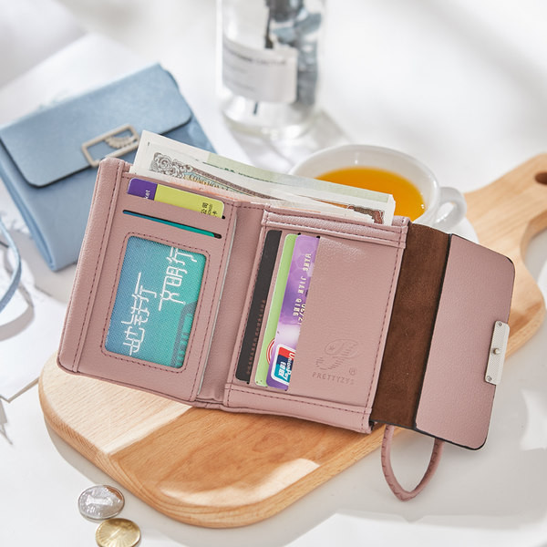 Γυναικείο έκο δερμάτινο πορτοφόλι με λαβή και μεταλλικό στοιχείο