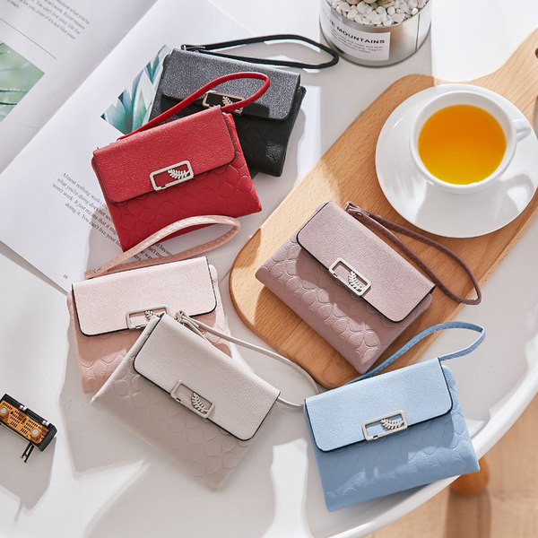 Γυναικείο έκο δερμάτινο πορτοφόλι με λαβή και μεταλλικό στοιχείο