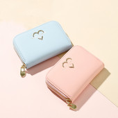 Sieviešu maks ar metāla rotājumu sirdi un rāvējslēdzēju