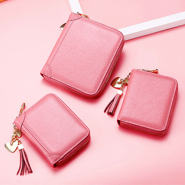 Γυναικείο μίνι πορτοφόλι με διαμερίσματα και φερμουάρ