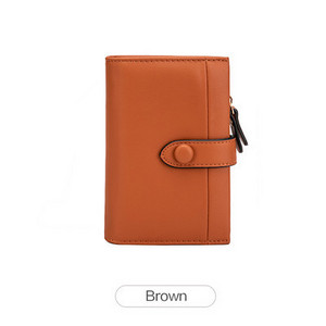 Πολυλειτουργικό γυναικείο πορτοφόλι κατασκευασμένο από faux δέρμα με μεταλλική στερέωση