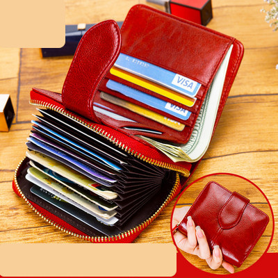 Γυναικείο πορτοφόλι από οικολογικό δέρμα με φερμουάρ και λαβή