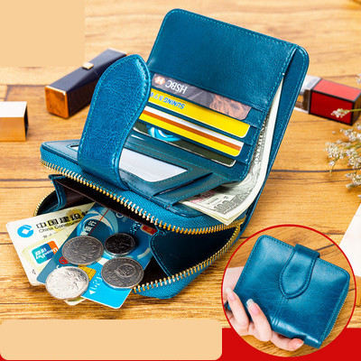 Γυναικείο πορτοφόλι από οικολογικό δέρμα με φερμουάρ και λαβή