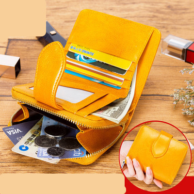 Γυναικείο πορτοφόλι από οικολογικό δέρμα με φερμουάρ και λαβή