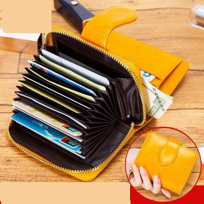 Γυναικείο πορτοφόλι από οικολογικό δέρμα με φερμουάρ και λαβή