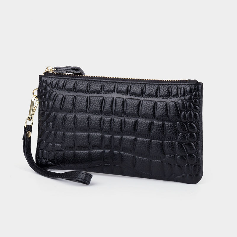 Sieviešu maks ar reljefu ādu un īsiem rokturiem