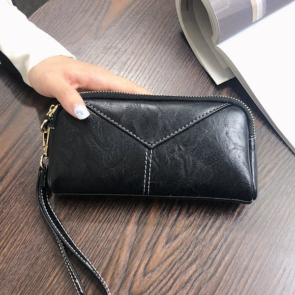 Sieviešu maks ar rokturi un rāvējslēdzēju