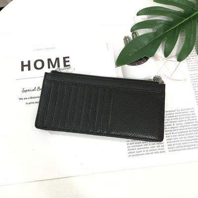 Sieviešu maks ar rāvējslēdzēju un karšu nodalījumiem