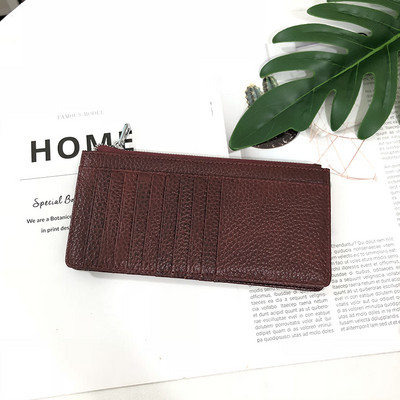 Sieviešu maks ar rāvējslēdzēju un karšu nodalījumiem