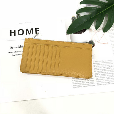 Sieviešu maks ar rāvējslēdzēju un karšu nodalījumiem