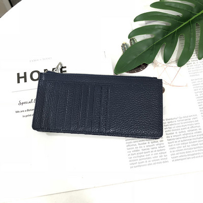 Sieviešu maks ar rāvējslēdzēju un karšu nodalījumiem