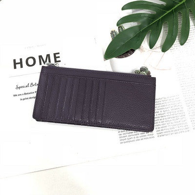 Sieviešu maks ar rāvējslēdzēju un karšu nodalījumiem