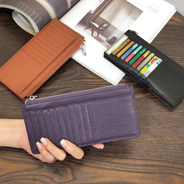 Sieviešu maks ar rāvējslēdzēju un karšu nodalījumiem