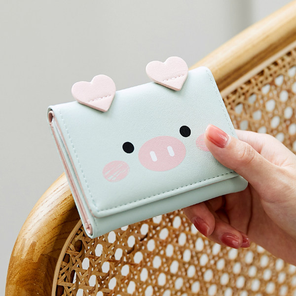 Mazs sieviešu ādas maciņš ar 3D elementu un aplikāciju