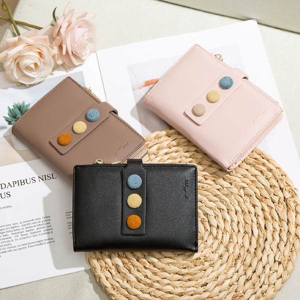 Sieviešu ādas maks ar krāsainām pogām un monētu nodalījumu