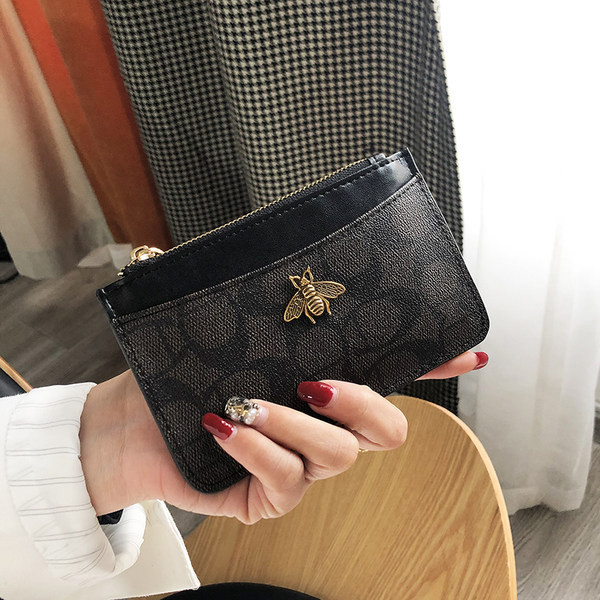 Mini portofel de dama cu fermoar si decor metalic