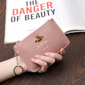 Sieviešu maks no eko ādas ar metāla apdari - ar rāvējslēdzēju