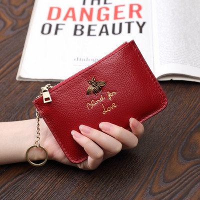 Sieviešu maks no eko ādas ar metāla apdari - ar rāvējslēdzēju