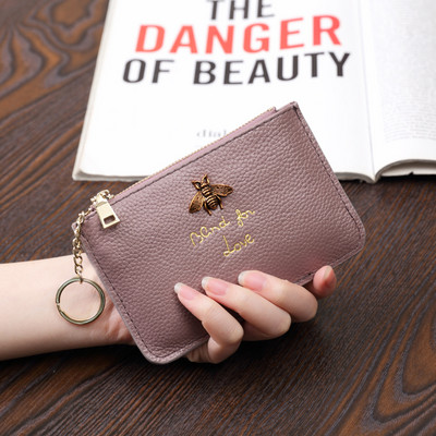 Sieviešu maks no eko ādas ar metāla apdari - ar rāvējslēdzēju