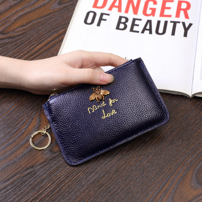 Sieviešu maks no eko ādas ar metāla apdari - ar rāvējslēdzēju