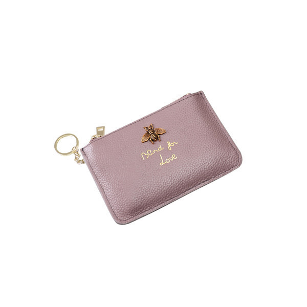 Sieviešu maks no eko ādas ar metāla apdari - ar rāvējslēdzēju