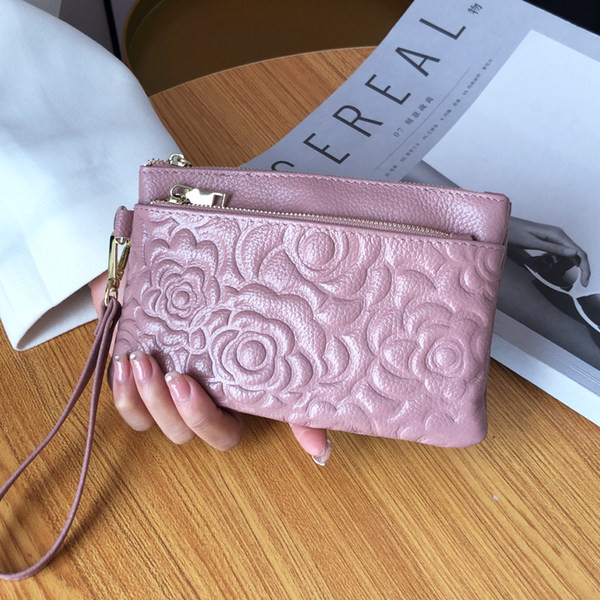 Sieviešu maks ar diviem rāvējslēdzēja nodalījumiem un rokturi