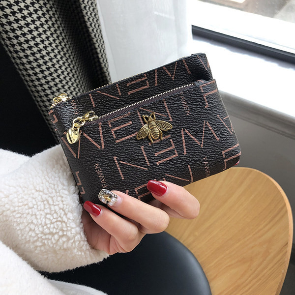 Sieviešu maks monētām ar rāvējslēdzēju un metāla apdari