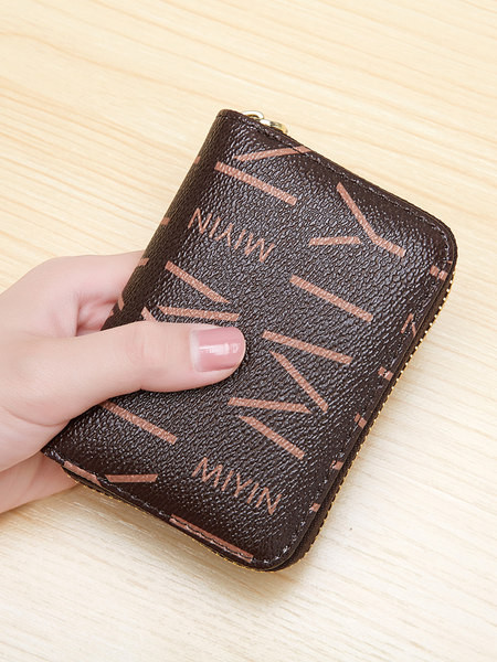 Neliels sieviešu maks ar dokumentu nodalījumiem