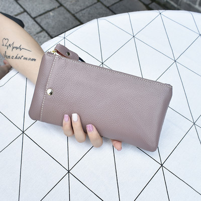 Sieviešu maks ar rokturi un nodalījumu telefonam un rāvējslēdzēju