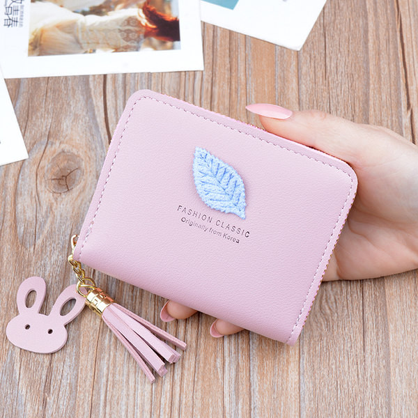 Sieviešu mini maks ar rāvējslēdzēju un 3D elementu