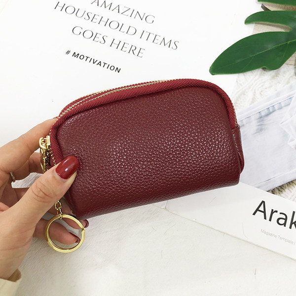 Sieviešu ādas somiņa ar kulonu