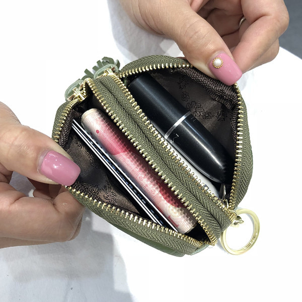 Sieviešu somiņa no eko ādas ar pušķiem