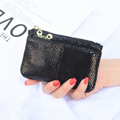 Sieviešu ādas maks ar rāvējslēdzēju un dzīvnieku apdruku