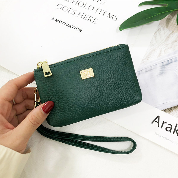 Geanta de dama moderna cu decor metalic