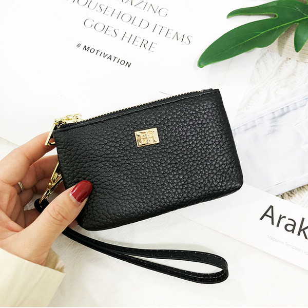 Geanta de dama moderna cu decor metalic